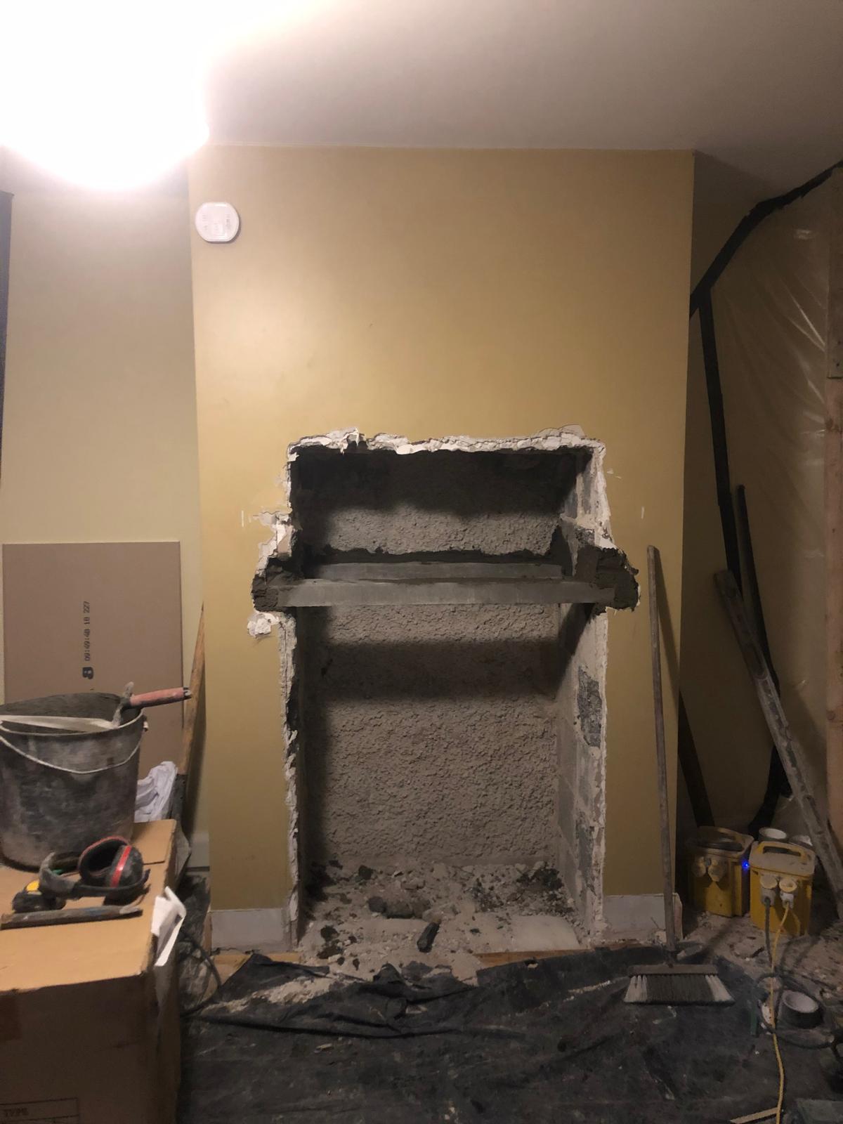 Chimney breast opened up to blockwork with a new lintel in place before the stove is fitted